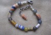 7″ w/ 1″ extension African sand-cast beads
